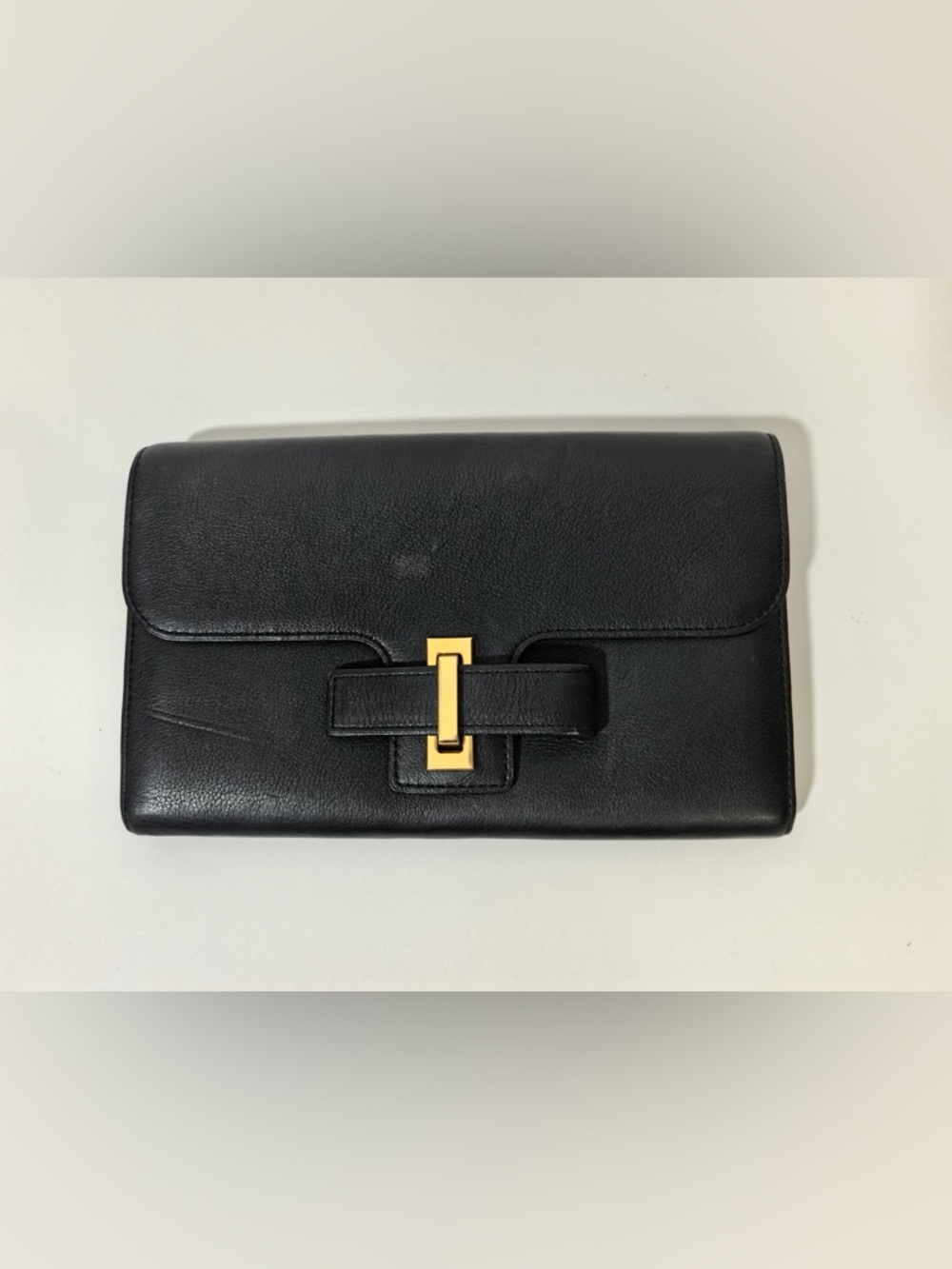 Pre-Owned Delvaux Black Leather Clutch with Gold Lock